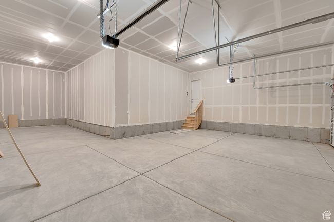 Garage with a garage door opener | Image 26