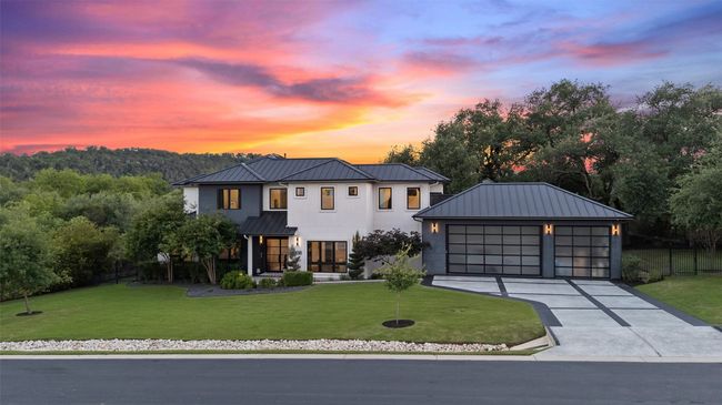 Welcome to 908 Cypress Grove, a custom-crafted home by Paradisa, this architectural gem sets the tone for luxury living. Impressive from every angle, including a spacious RV/boat garage with front and rear access. | Image 4