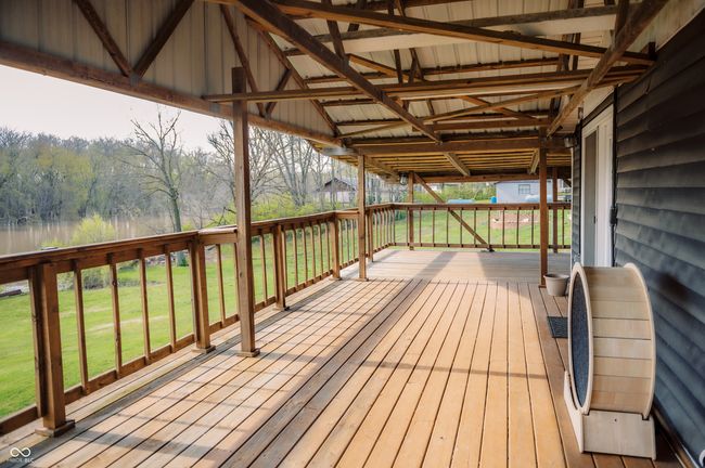 deck featuring a lawn | Image 9