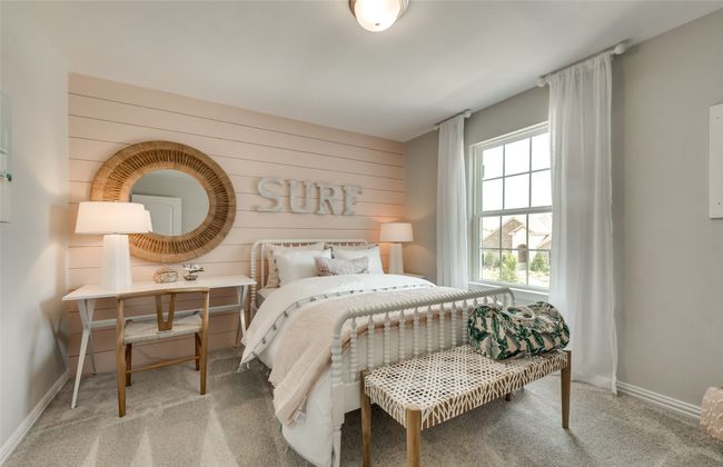 Spacious secondary bedroom with ample closet space *Photos of furnished model. Not actual home. Representative of floor plan. Some options and features may vary | Image 21