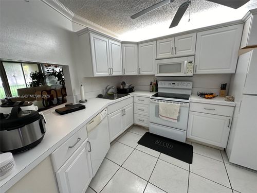 105-1-1750 Ne 191st St, Miami, FL, 33179-4284 | Card Image