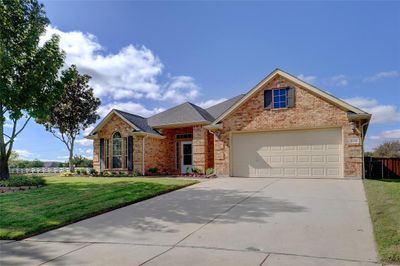 9808 Garden Court, House other with 4 bedrooms, 2 bathrooms and null parking in Denton TX | Image 2