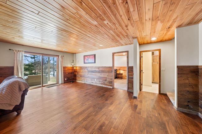 Lower level includes 2 bedrooms, 3/4 bath, and large storage room. | Image 25