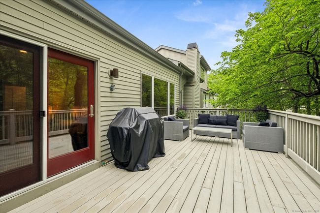 Enormous, private 23x12 deck off of the family room. | Image 11