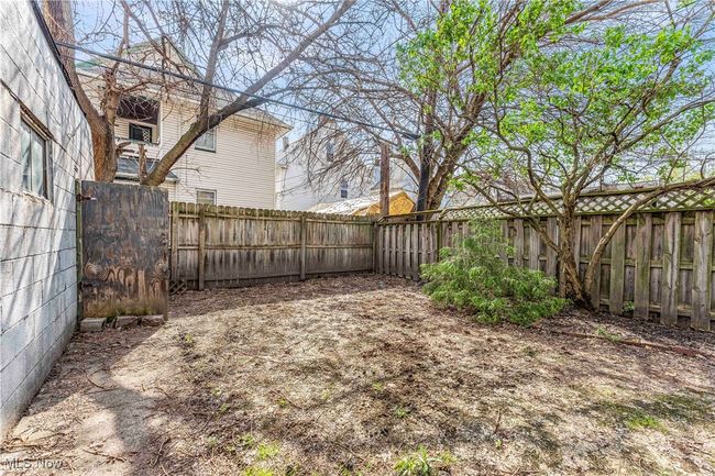 View of yard with a fenced backyard | Image 27