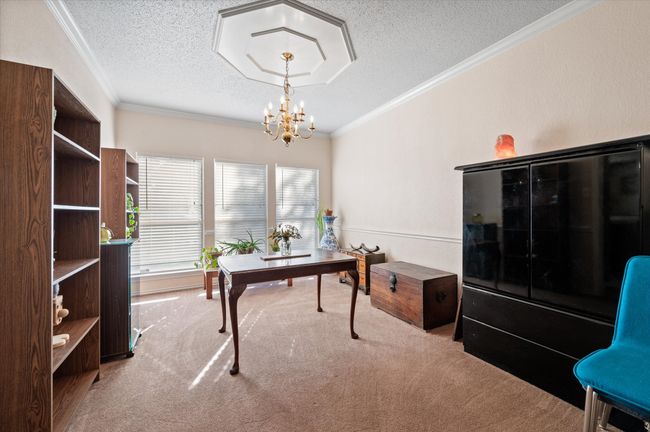 View of the formal dining space looking towards the fron tof the home. | Image 21