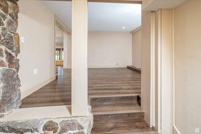 Stairway featuring wood finished floors | Image 28