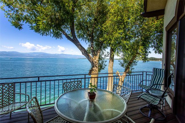 Balcony overlooking the water and mountain view | Image 4