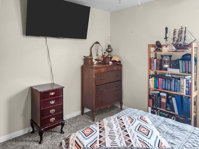 Carpeted bedroom 1 with baseboards | Image 22