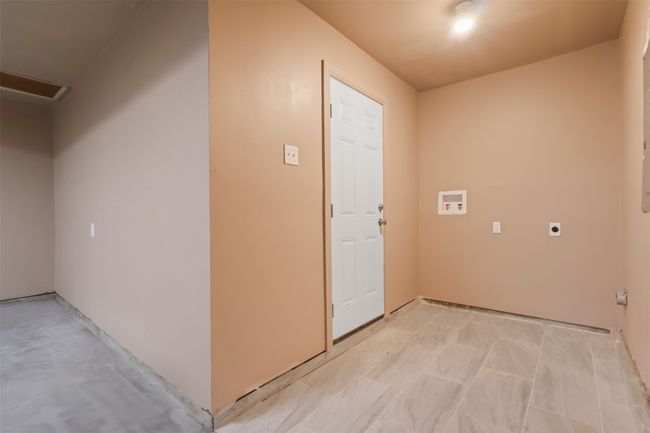 Laundry room featuring electric dryer hookup and washer hookup | Image 20