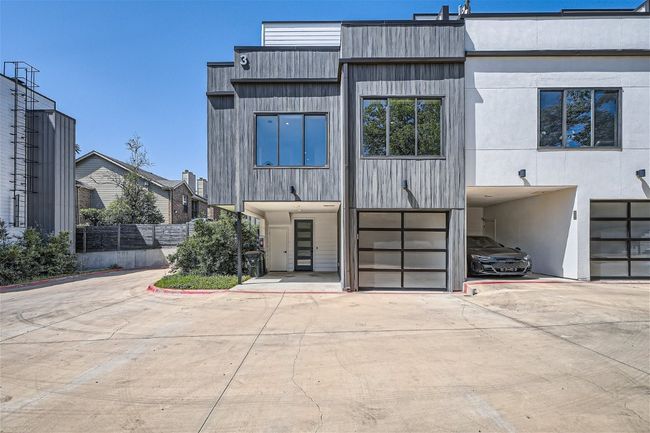 Parking is a breeze with both a 1-car carport and a 1-car garage. | Image 7