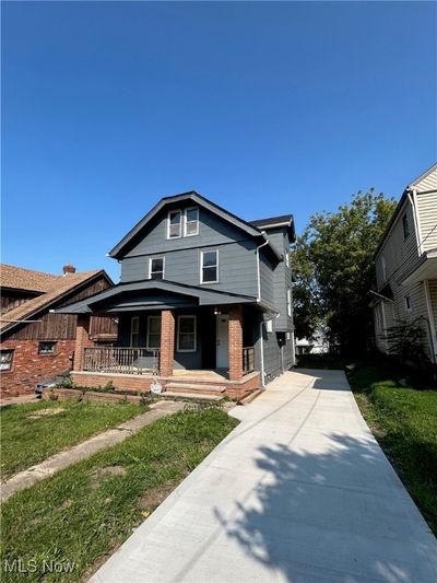 View of front facade featuring a front lawn and covered​​‌​​​​‌​​‌‌​‌‌​​​‌‌​​‌‌​‌​​​​​‌ porch | Image 2