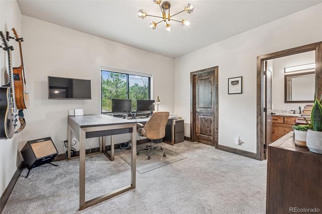 Main Level Guest Bedroom with suite and walk-in closet | Image 29