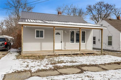 1483 Carman St, Burton, MI, 48529-1209 | Card Image