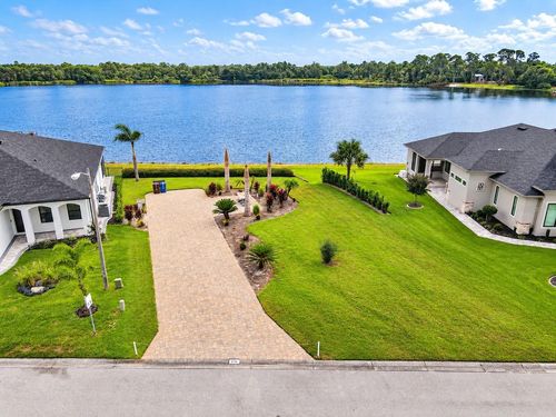 676 Meandering Way, POLK CITY, FL, 33868 | Card Image