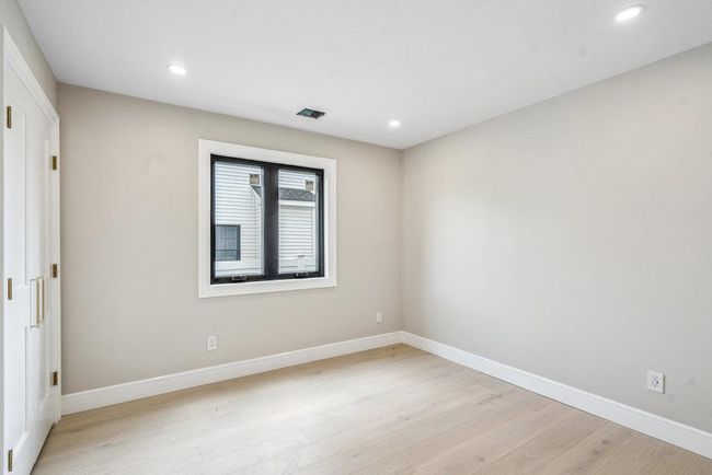 Bedroom featuring Hardwood flooring and recessed lighting | Image 21