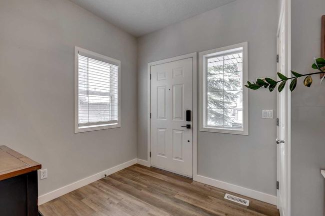 114 Chapalina Close Se, Home with 5 bedrooms, 3 bathrooms and 4 parking in Calgary AB | Image 2