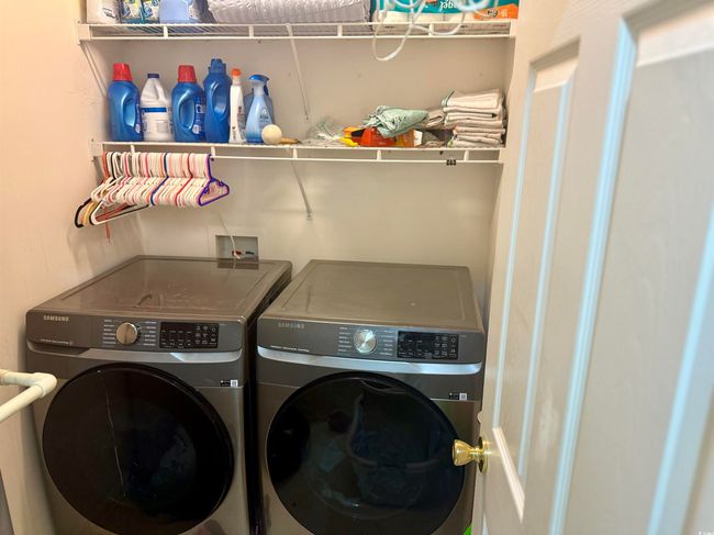 Washroom with washer and clothes dryer | Image 15