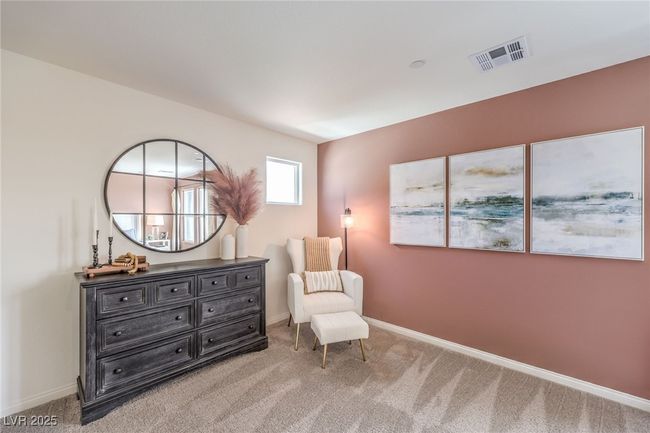 Photo is representational only; actual home finishes may vary. Sitting room with carpet flooring and baseboards | Image 24