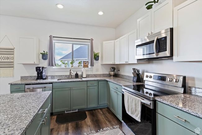 6 - 1015 W 3000 N N, House other with 4 bedrooms, 3 bathrooms and 2 parking in Pleasant View UT | Image 9