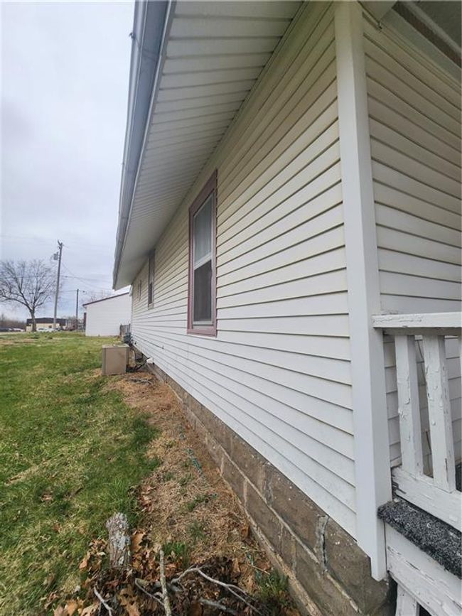 View of side of property featuring a yard | Image 6