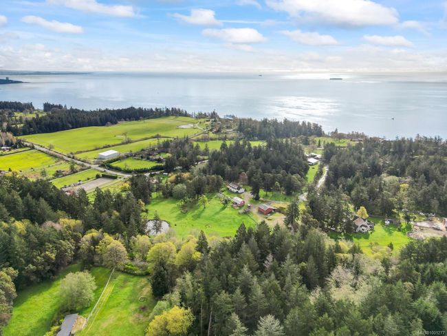 View of property location with a nearby body of water | Image 52
