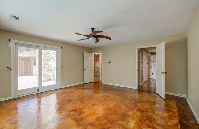 Newer sliding glass doors in primary room. | Image 23