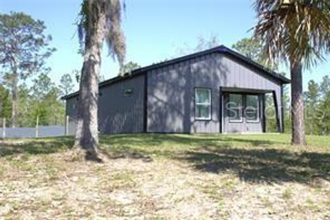 4030 Ne 140 Th Ct, House other with 2 bedrooms, 2 bathrooms and null parking in WILLISTON FL | Image 4