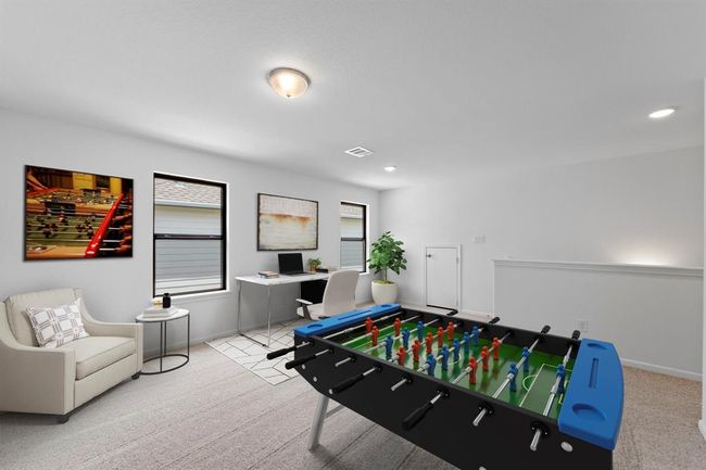 As you make your way upstairs this exceptional game room is a standout feature in this remarkable property, offering a space that combines luxury and fun for all ages. | Image 15