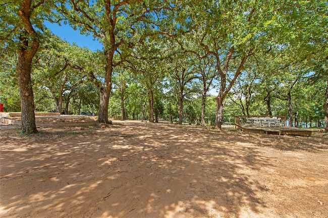 View of yard featuring a wooden deck | Image 20