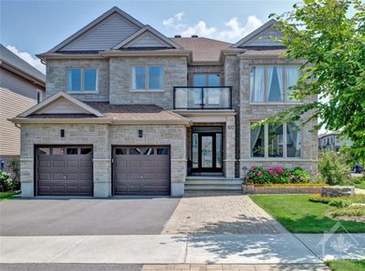 107 Dun Skipper Dr, House other with 9 bedrooms, 5 bathrooms and 5 parking in Ottawa ON | Image 1