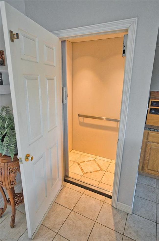 Take the Stairs or take the Elevator up. 750 lb capicity | Image 10