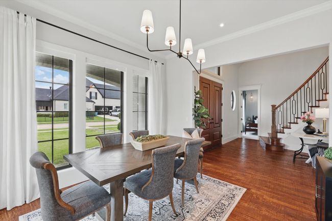 Designer touches include crown molding plus window and door trim | Image 10