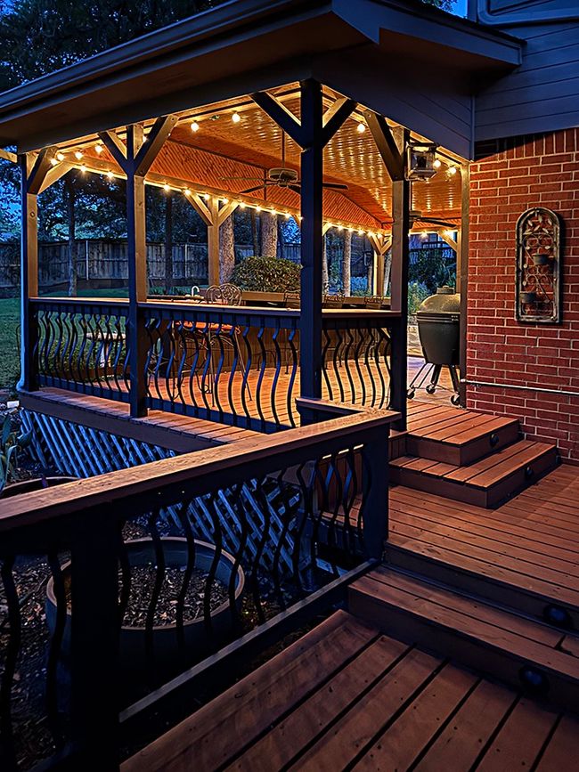 Night view of outdoor kitchen from deck | Image 30