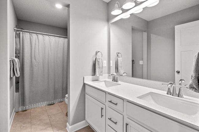 Upper level full bathroom | Image 34