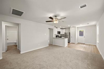 Spacious living room, open to the kitchen and dining area. | Image 3