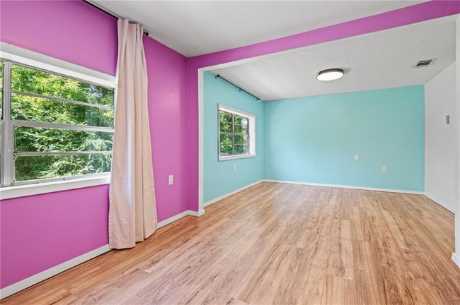 Unfurnished room with wood finished floors | Image 15
