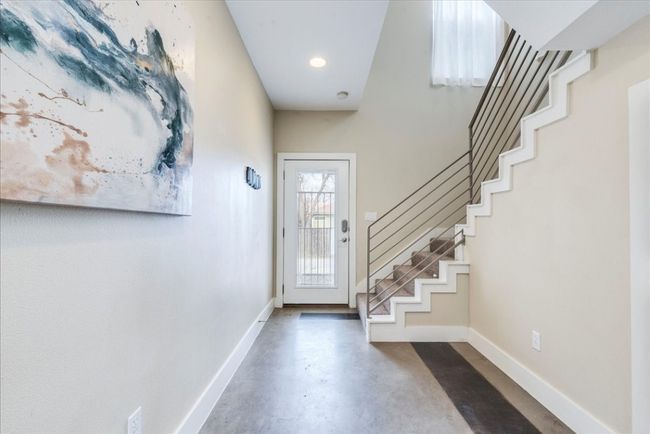 Front door and entry hallway. | Image 15