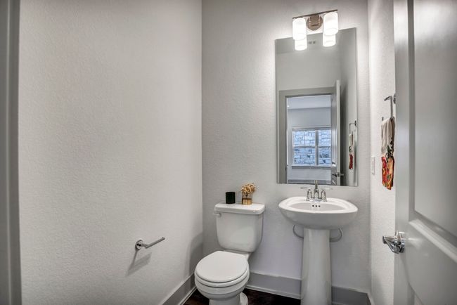 Powder room on the first floor | Image 11
