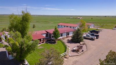 10133 County Road 110, Home with 5 bedrooms, 3 bathrooms and 4 parking in Carr CO | Image 1