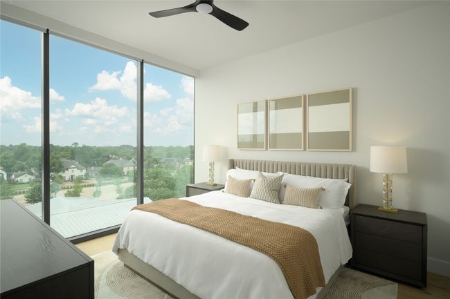 Bedroom featuring multiple windows, wood finished floors, expansive windows, and ceiling fan | Image 7