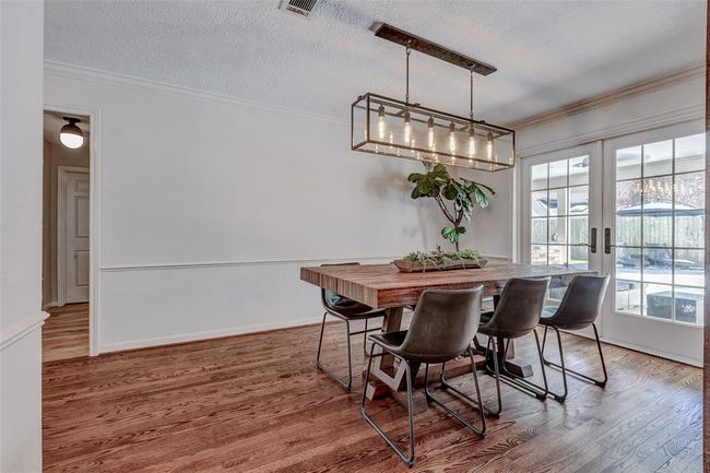 Dining Room from Kitchen hall on left to study and primary bedroom | Image 19
