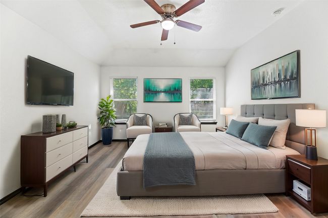 Primary bedroom with vaulted ceilings | Image 11