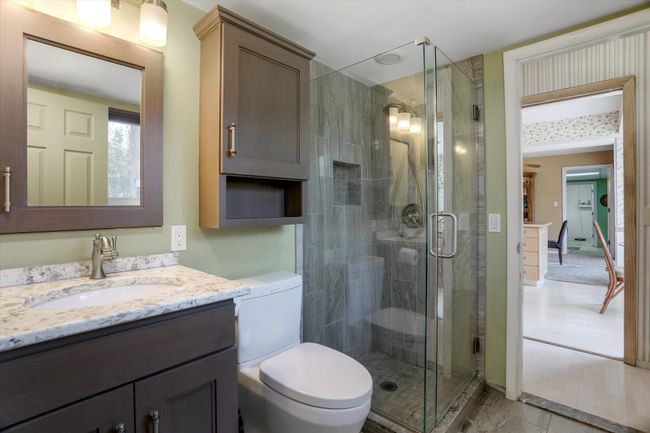 Updated full bath #1 adjacent to primary bedroom | Image 5