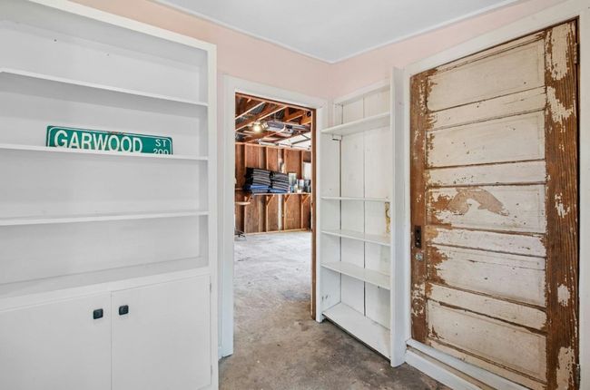 Side building to garage for extra storage | Image 35
