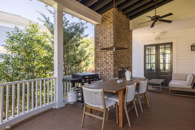 Back porch dining & fireplace | Image 50