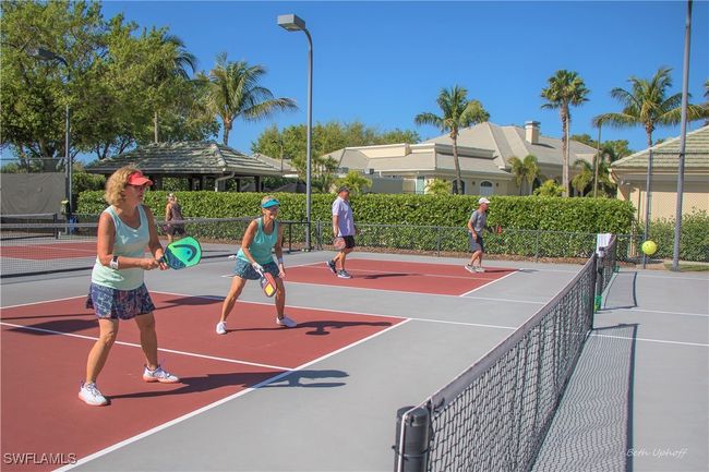 View of tennis court featuring basketball court | Image 44