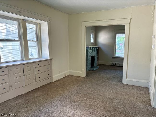 dining room looking into living room | Image 6