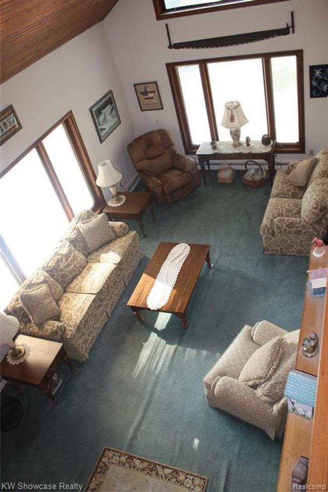 Looking down on the living room from the loft area. | Image 45