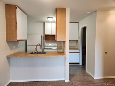 Kitchen with LVP flooring | Image 2